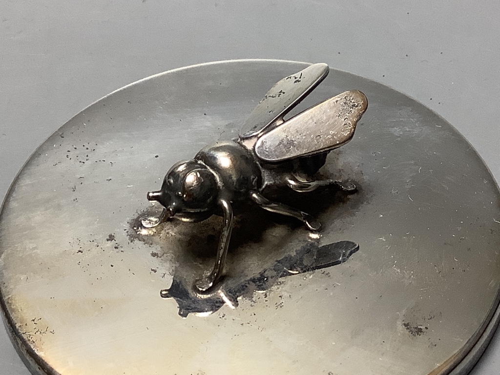 A Brazilian white metal preserve pot on stand with bee finial, height 9.2 cm